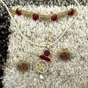 Red emerald with pearls, brand new